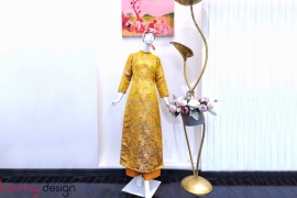 Brocade long dress with yellow wave pattern